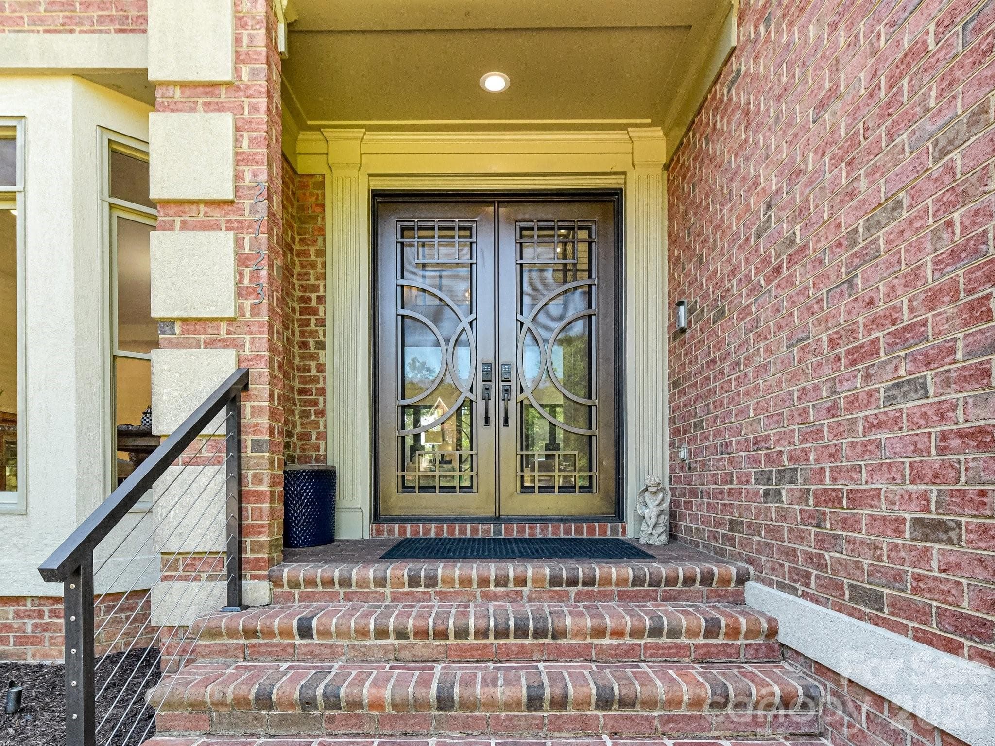 Custom exterior steel doors throughout with screens and operable glass panels. - 2723 Providence Pine Lane, Charlotte