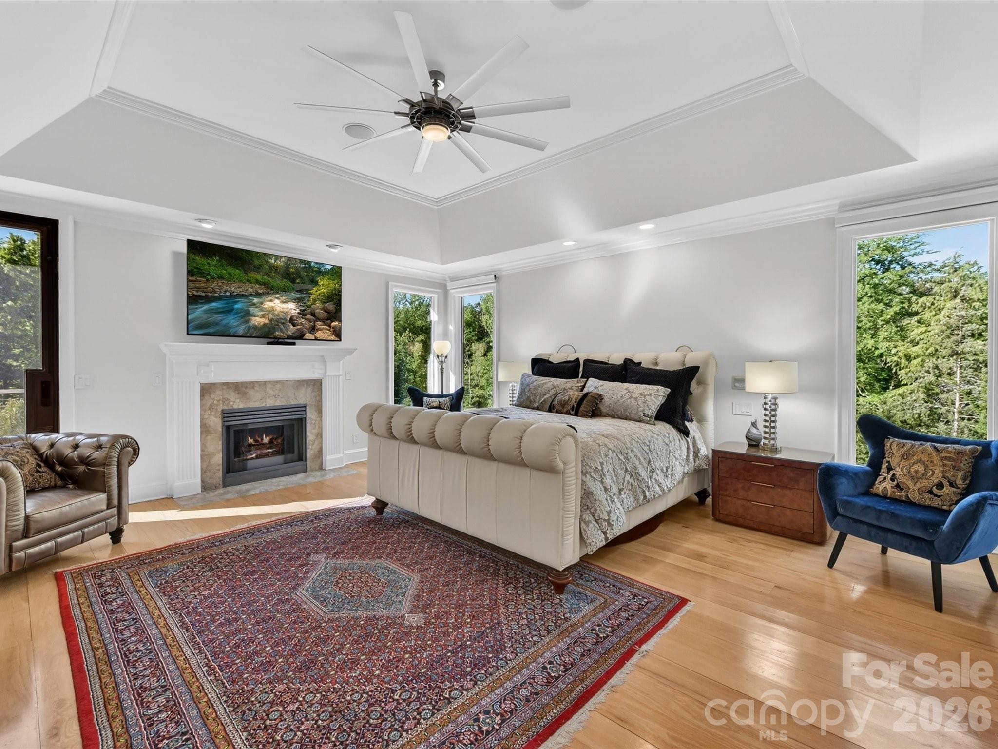 Primary retreat with terrace access & floor to ceiling windows with Hunter Douglas shades. - 2723 Providence Pine Lane, Charlotte