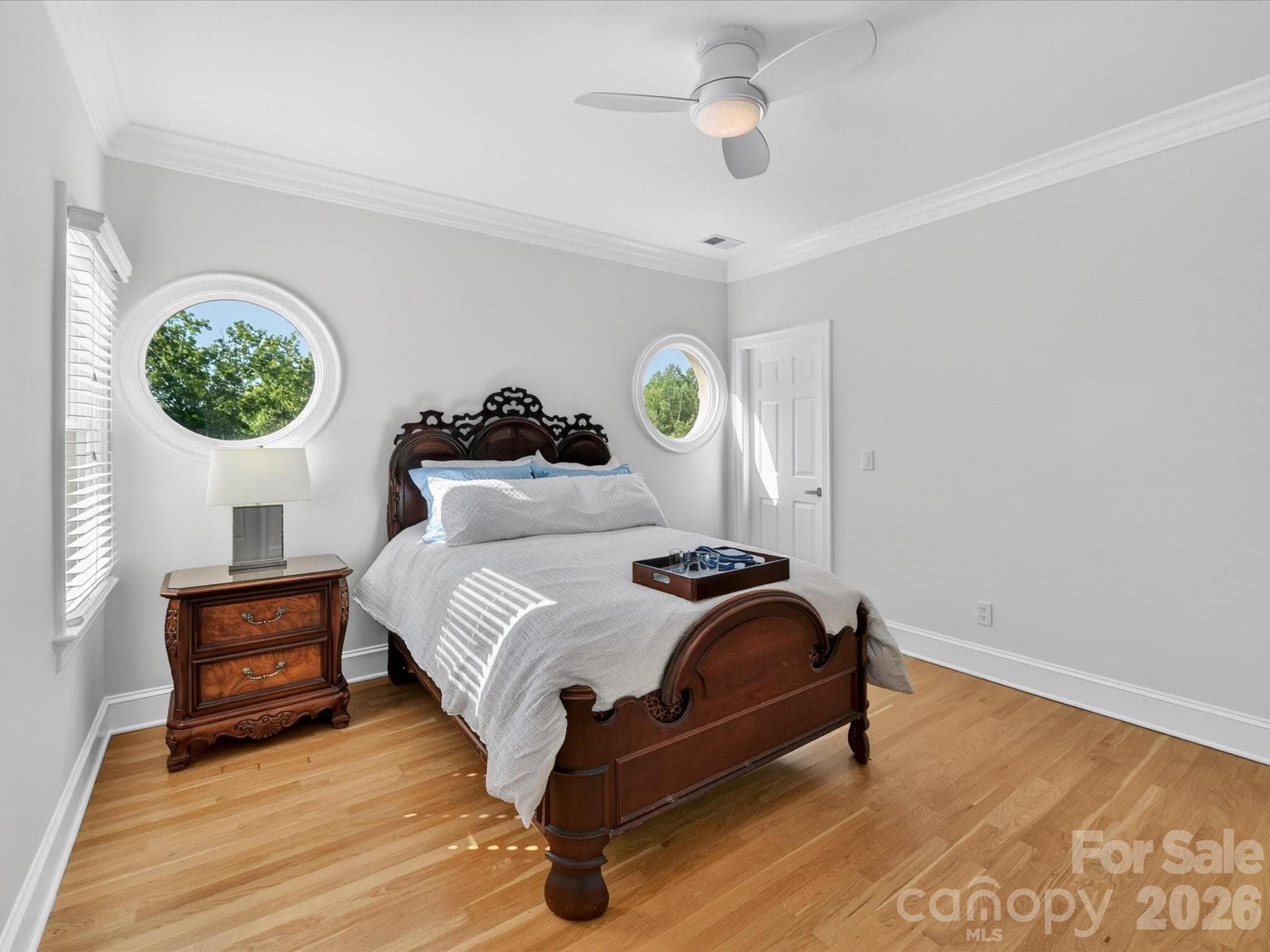 Bedroom two with ensuite bath & permanent stairs to floored attic space. - 2723 Providence Pine Lane, Charlotte