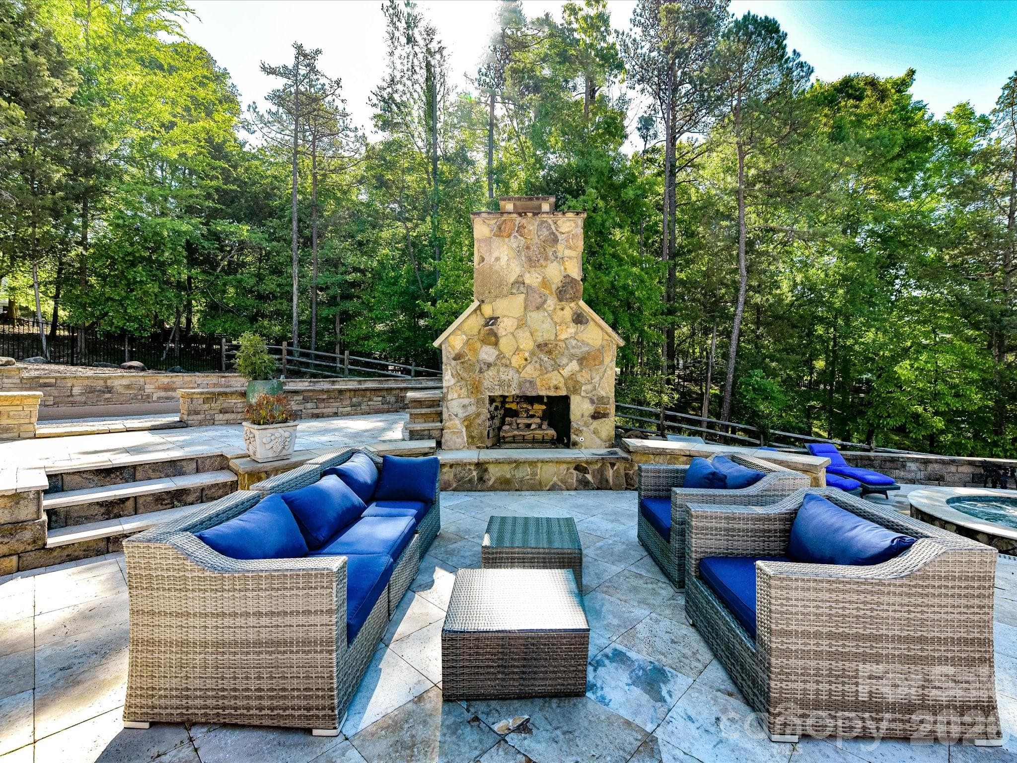 Outdoor fireplace for enjoying perfect Carolina evenings! - 2723 Providence Pine Lane, Charlotte