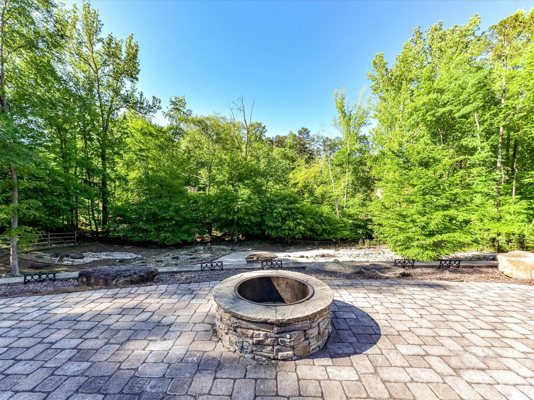 Backyard fire pit area in addition to the outdoor fireplace. - 2723 Providence Pine Lane, Charlotte