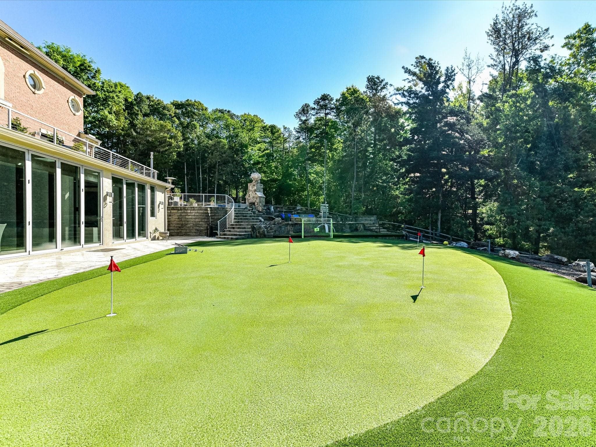 The perfect place to kick soccer balls or putt golf balls. - 2723 Providence Pine Lane, Charlotte