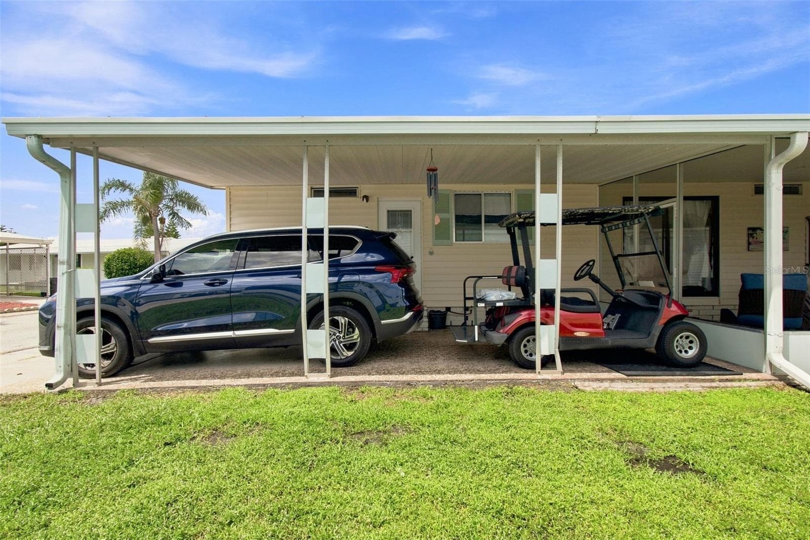GOLF CART INCLUDED WITH THE SALE! - 56 PELICAN DR S, OLDSMAR