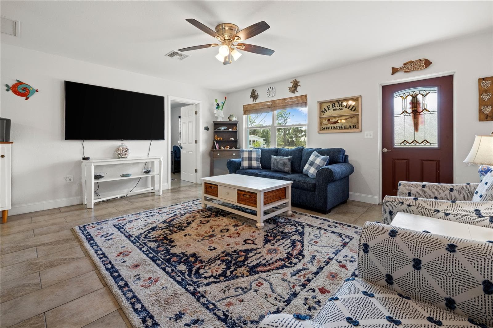 The home is bright and clean. - 7035 DUKE ST, ENGLEWOOD