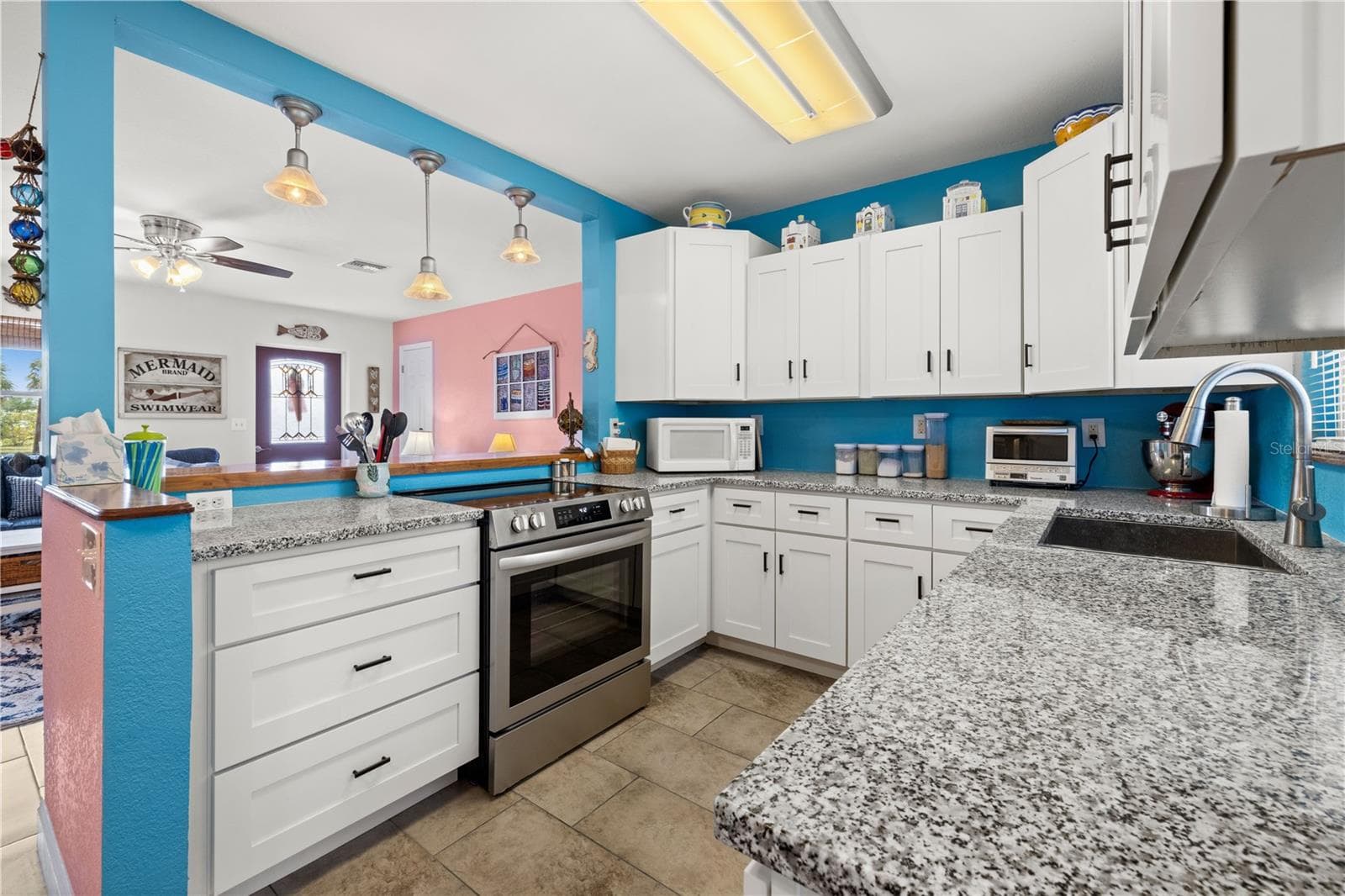 Here's another view of the kitchen.  The kitchen sink is deep and there is an exterior view through the window above it. - 7035 DUKE ST, ENGLEWOOD