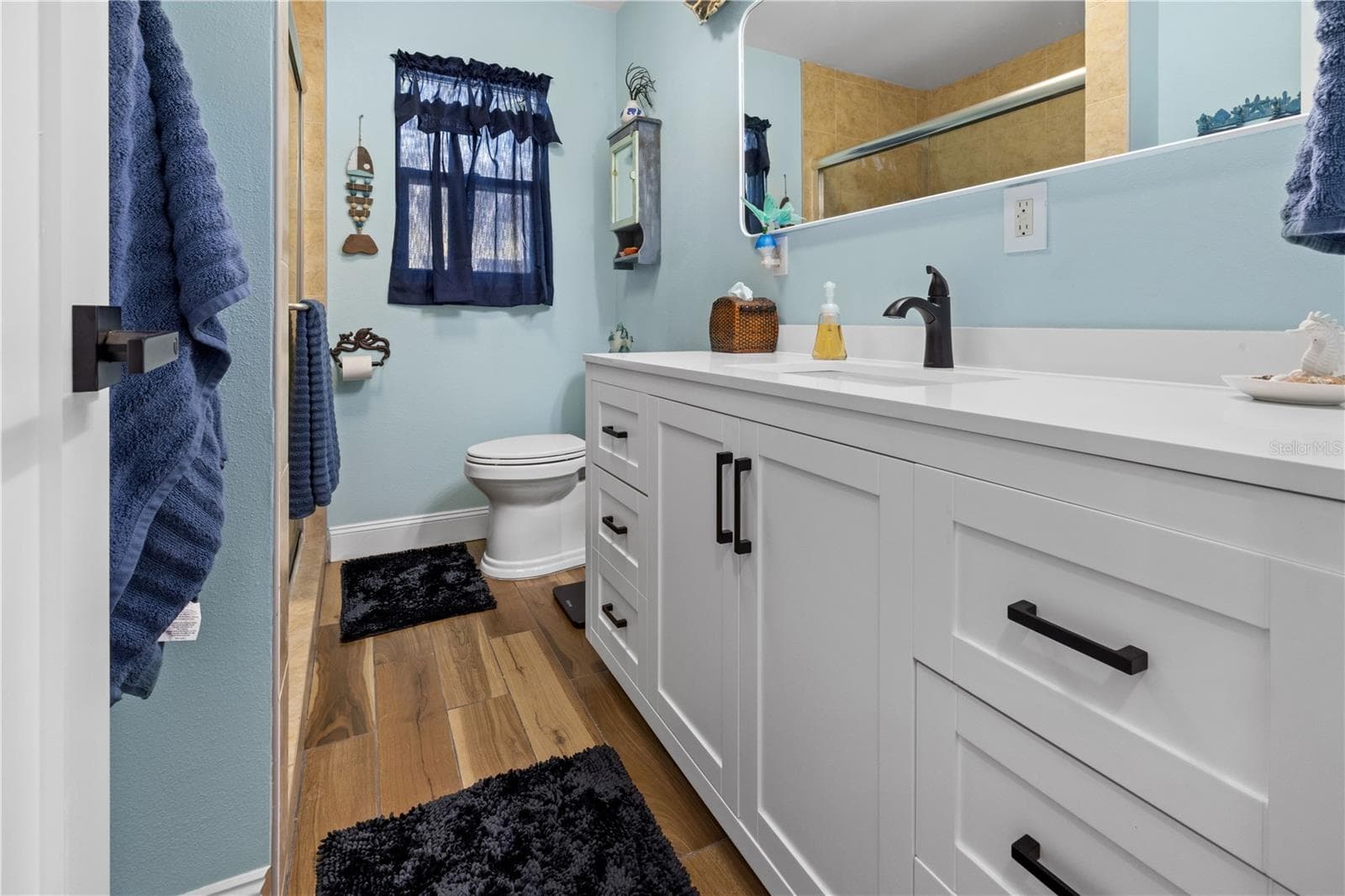 The bathroom has been updated. It has a shower. - 7035 DUKE ST, ENGLEWOOD