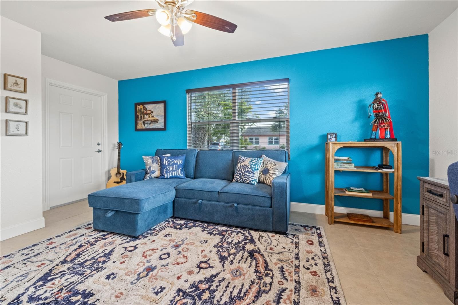 The third bedroom is off the living room  It also has it's own private entry to the outside lanai.  It has a walk-in closet. - 7035 DUKE ST, ENGLEWOOD