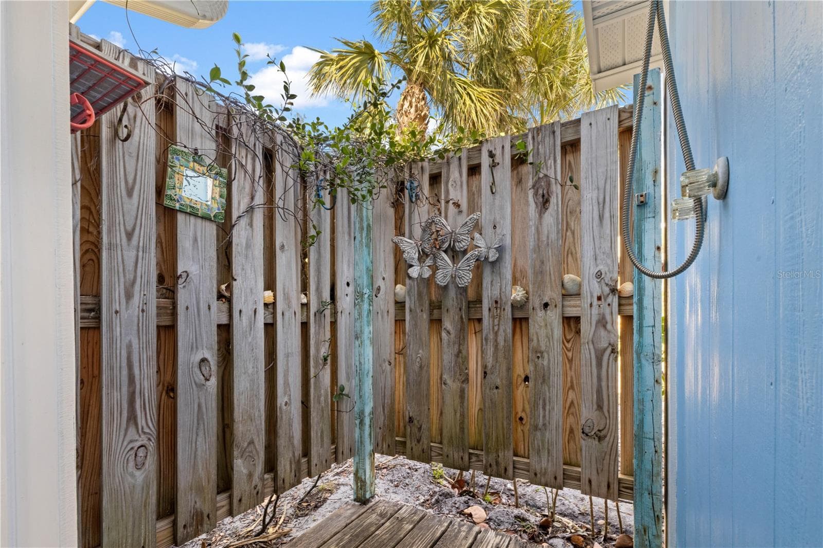 This is the outdoor shower!  It has hot and cold water!  You go from the inside to shower on the outside with privacy! - 7035 DUKE ST, ENGLEWOOD