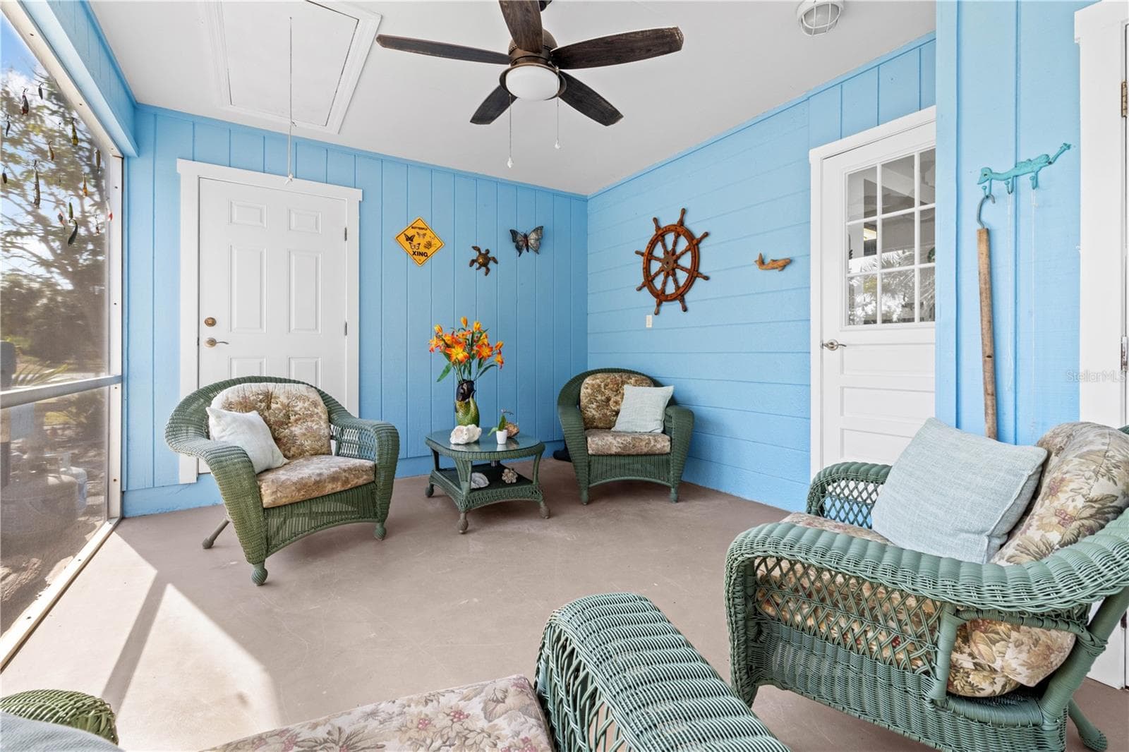 Another view of the lanai.  The door at the rear opens into the third bedroom. - 7035 DUKE ST, ENGLEWOOD