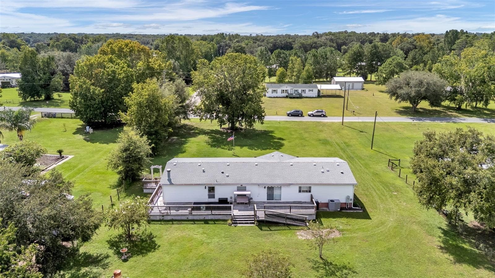 back of the home showing full deck - 11457 N LINDA MARIE TER, DUNNELLON