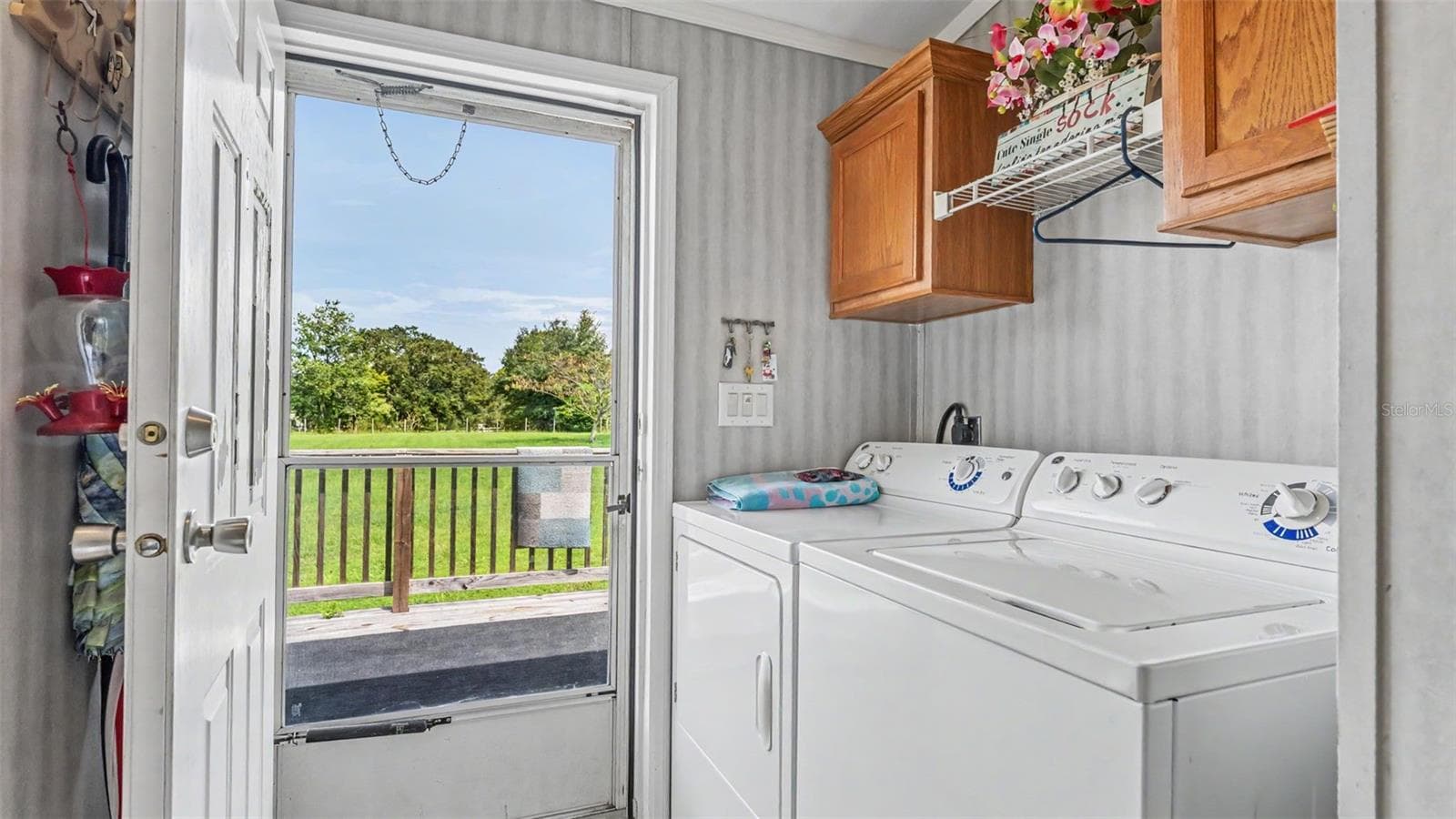 laundry room that leads to the back deck/porch - 11457 N LINDA MARIE TER, DUNNELLON