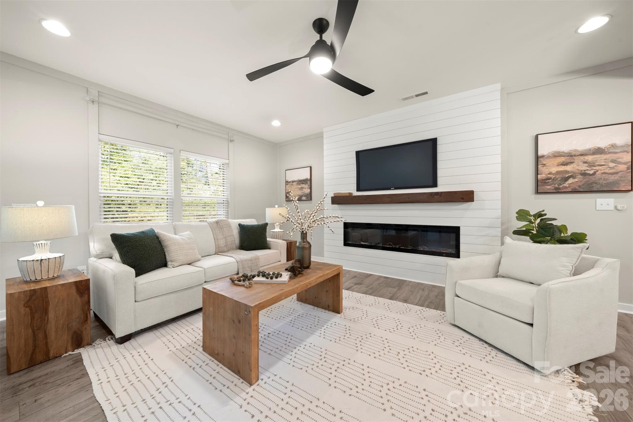 Living room with colorful electric fireplace - 1115 Streamside Lane, York