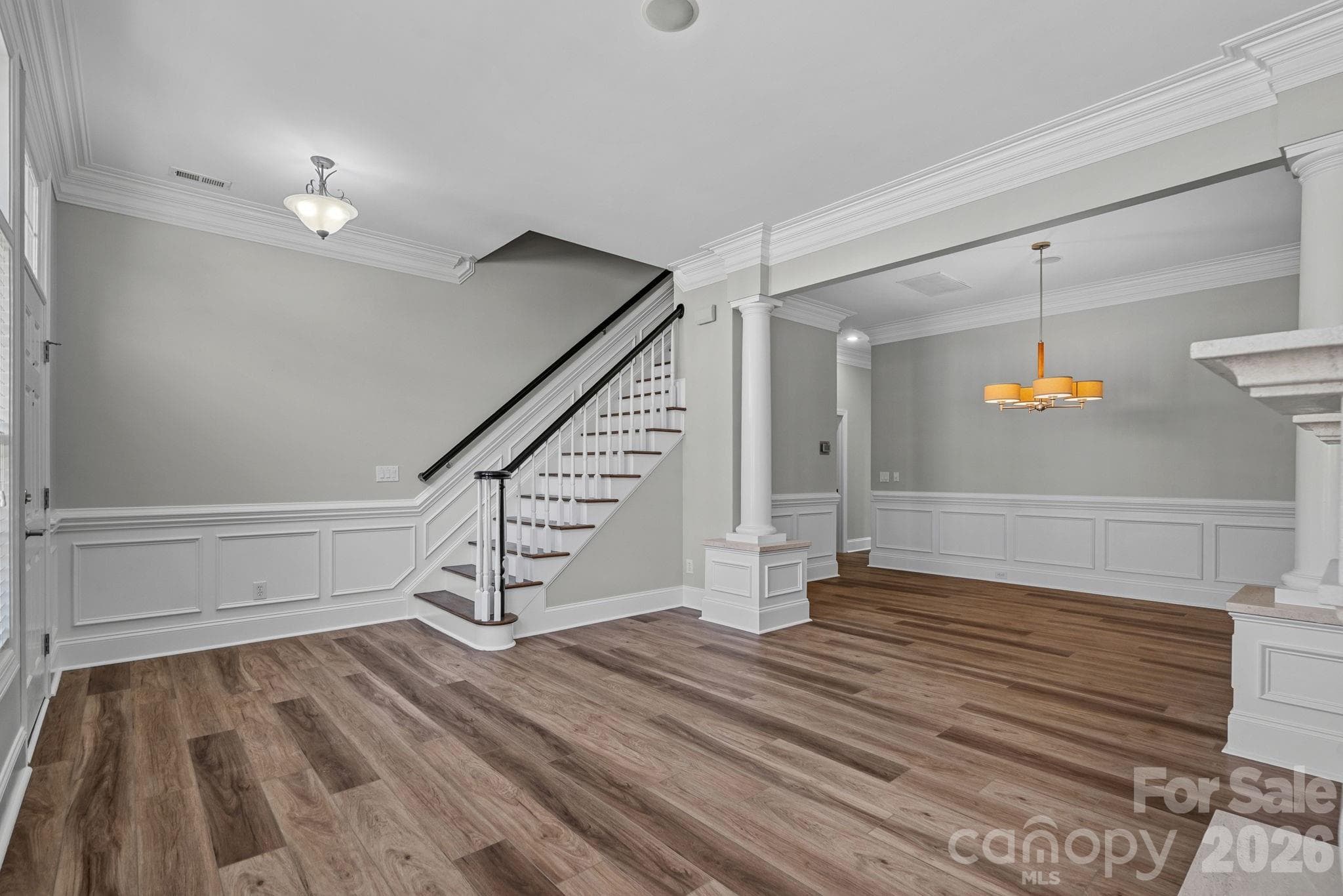 Living room into dining room - 6415 Wakehurst Road, Charlotte