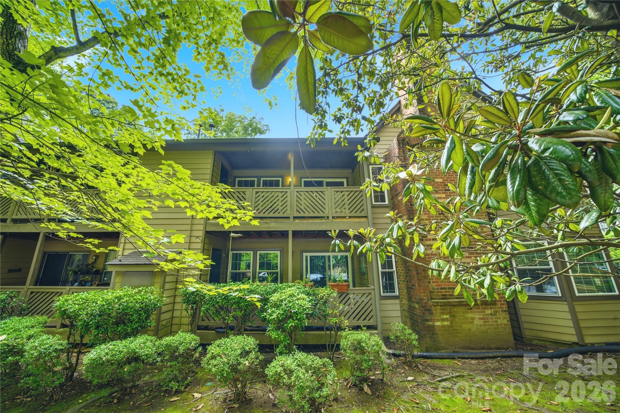 Private balcony overlooking the back of the property - Charlotte