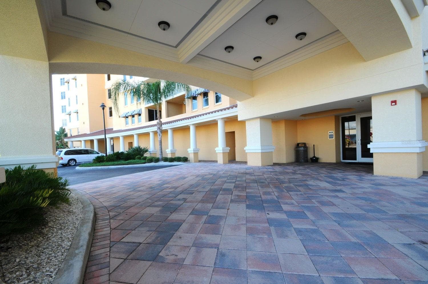 ... Large Covered Portico At Entrance Of the Sereno. Complex has 3 Banks of Elevators - Each Floor has only 3 Units Per Hallway Affording Peace & Privacy. Residence # 404 Accessed Through Main Lobby Shown in Photo. - 15208 GULF BLVD #404, MADEIRA BEACH