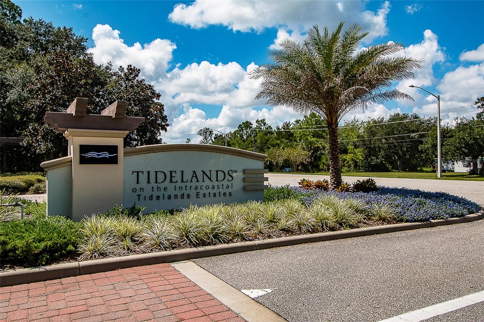 MAIN ENTRY FOR TIDELANDS, GATED AND SECURE - 115 RIVERVIEW BND S #2123, PALM COAST