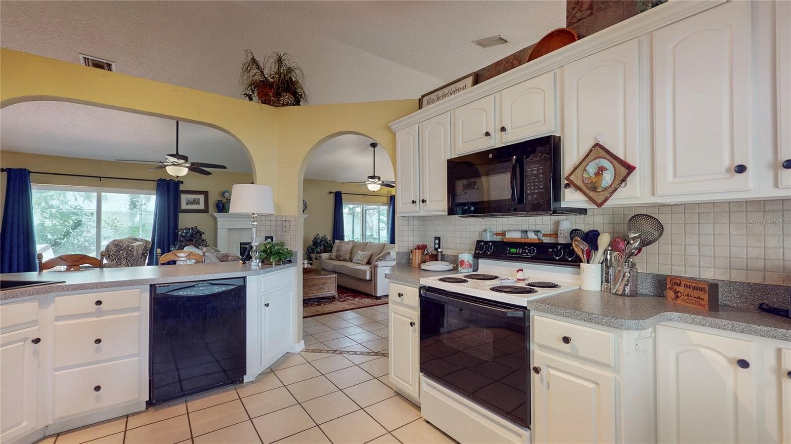 Kitchen opens to Living Room - 2579 STARDUST AVE, EUSTIS