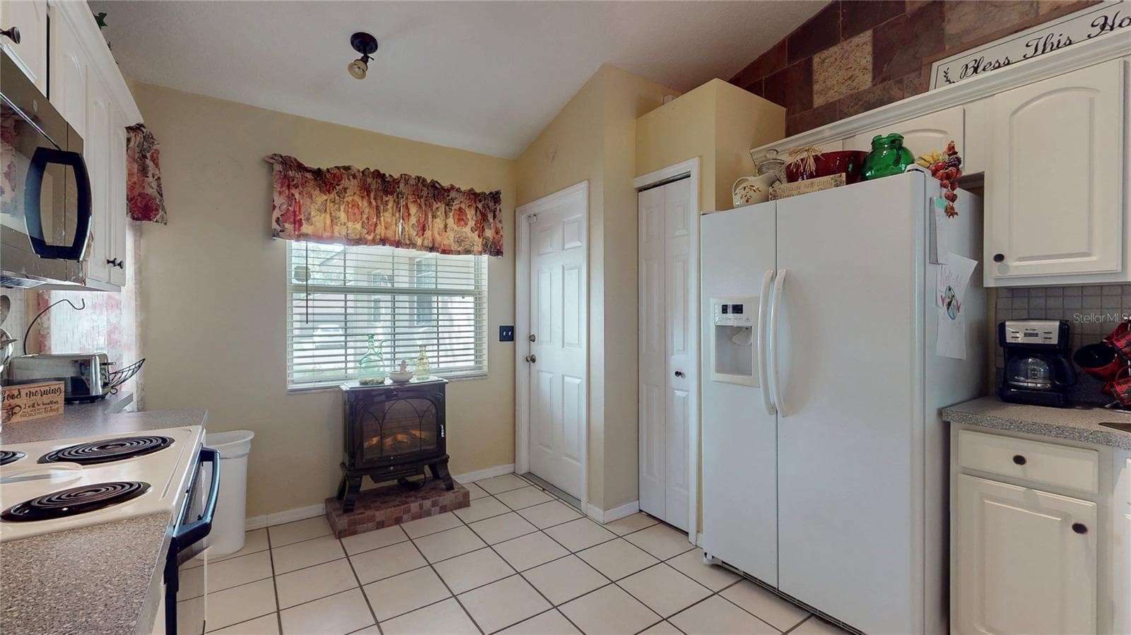 Entrance from Garage to Kitchen - 2579 STARDUST AVE, EUSTIS