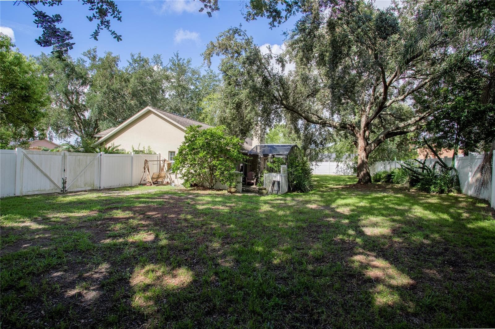 Fenced back yard - 2579 STARDUST AVE, EUSTIS