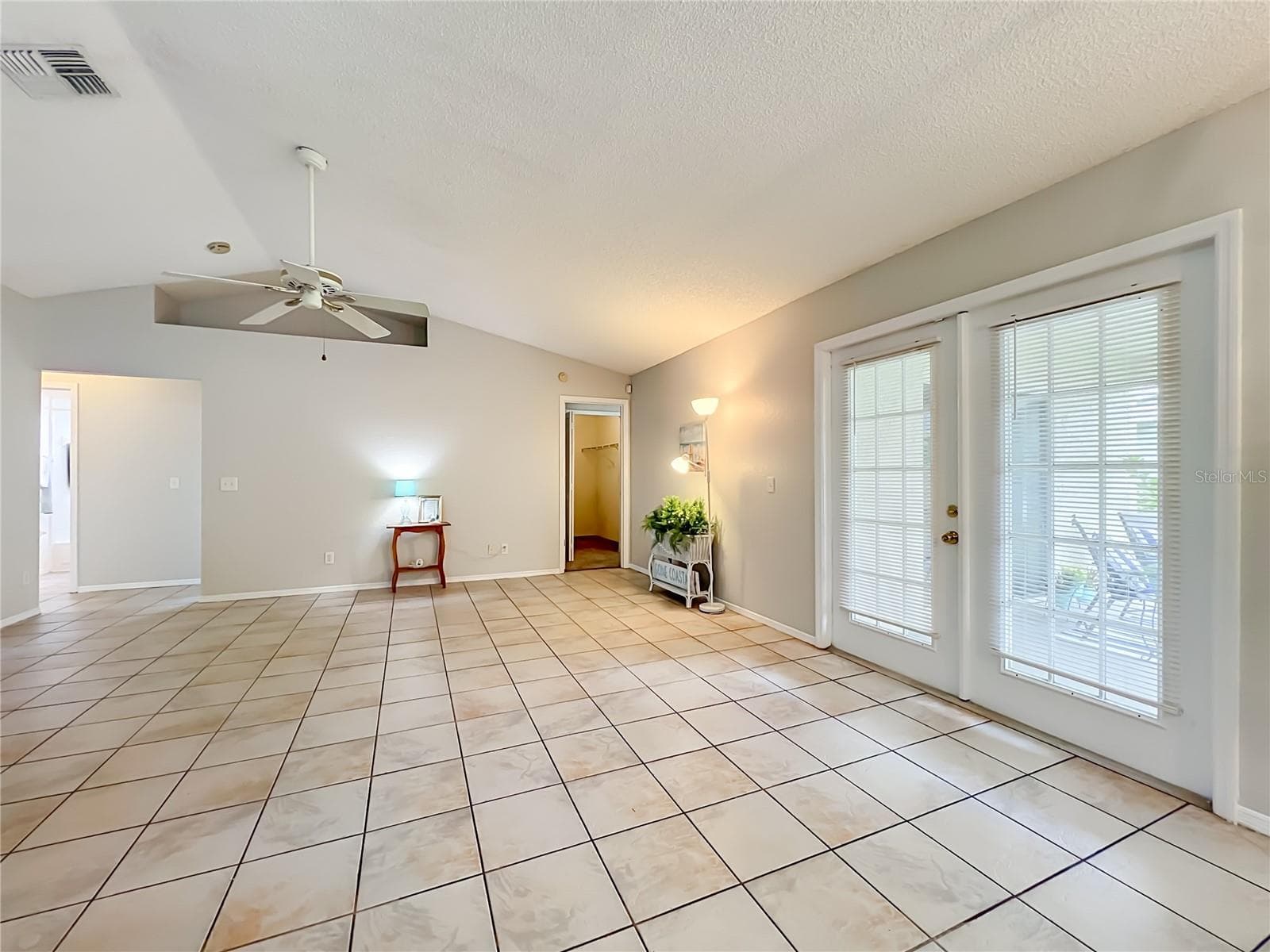 FRENCH DOORS TO COVERED PATIO - 12941 DOWNSTREAM CIR, ORLANDO
