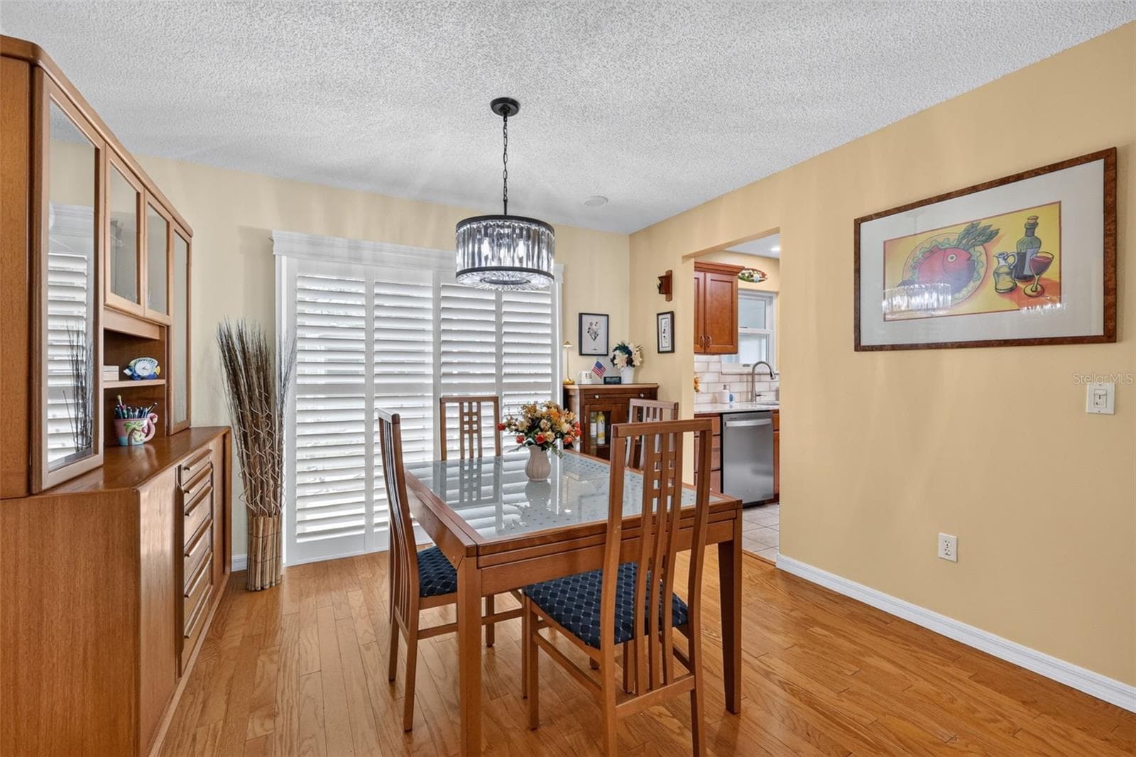 Spacious Dining room with Sliding Doors to the Lanai - 1503 ESCANDON PL, THE VILLAGES
