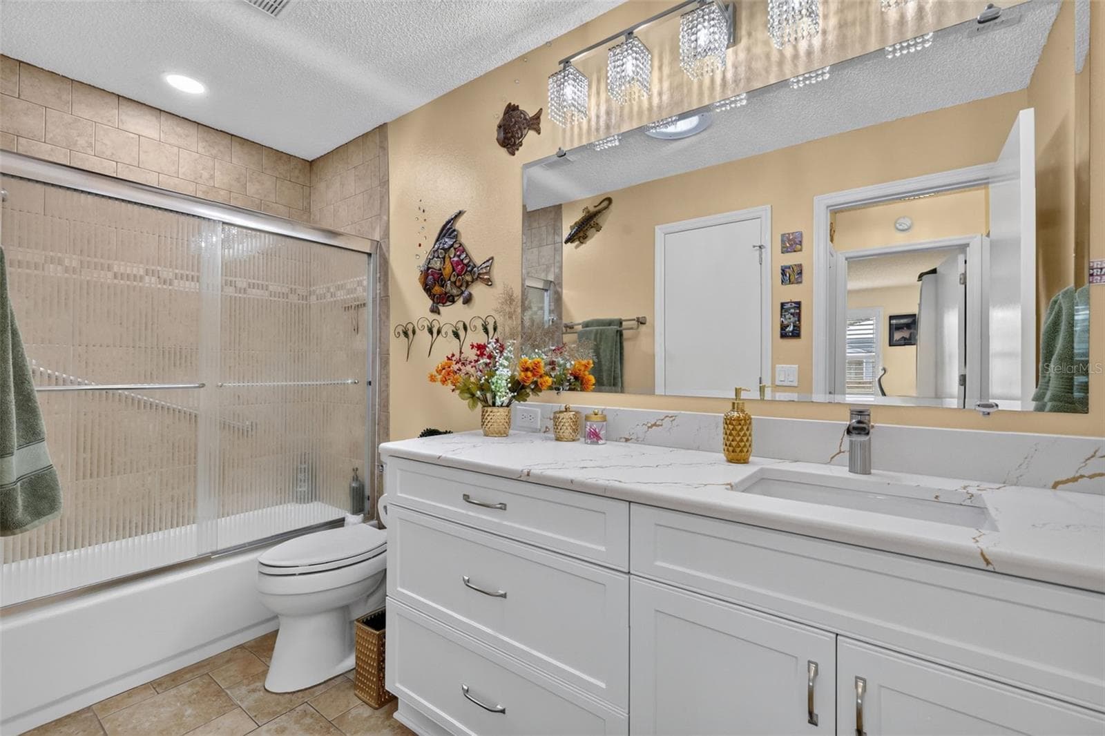 Guest bath - Quartz Counters, New Vanities and Fixtures - 1503 ESCANDON PL, THE VILLAGES