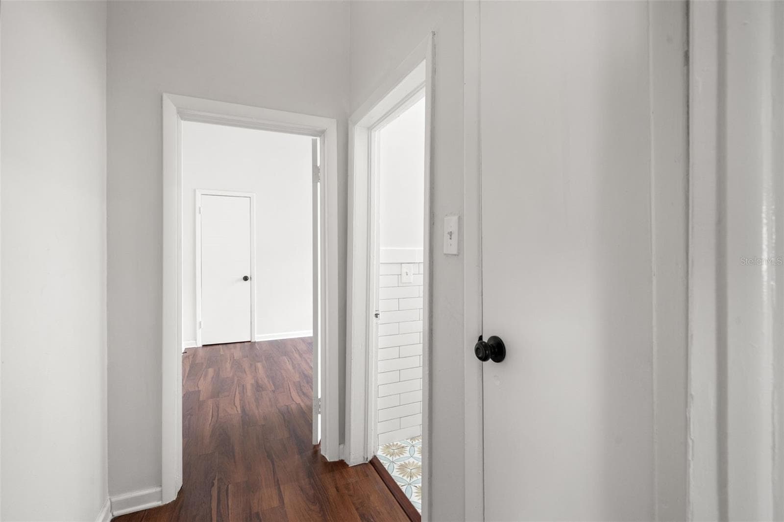 Hallway to front bathroom and second bedroom - 1310 E 15TH AVE, TAMPA