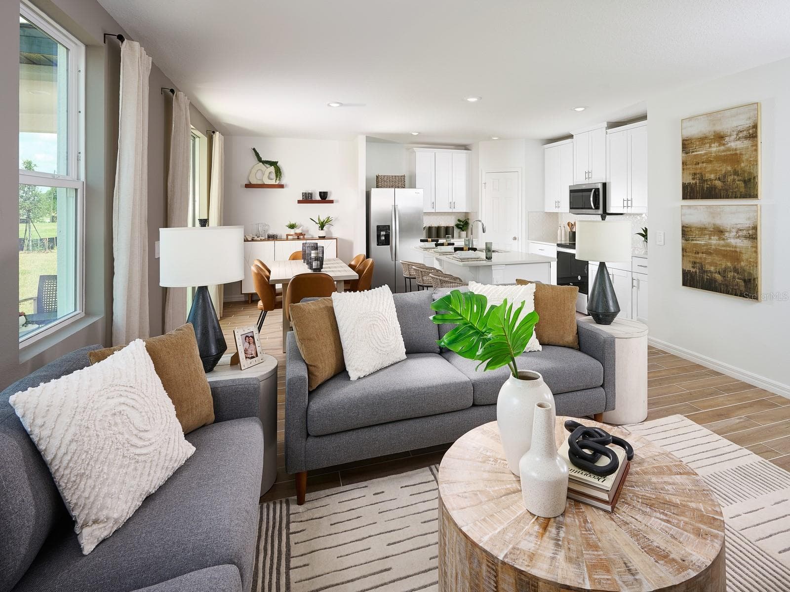 Photo is not of the actual home, but is an inspirational photo of builder’s model home and may depict options, furnishings, and/or decorator features that are not included. - 725 IMPALA RD, LAKE ALFRED