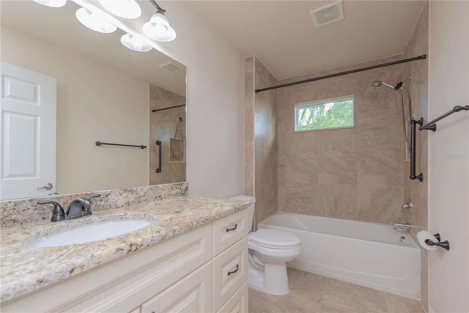 Guest bathroom. - 5065 ROYAL PALMS WAY #303, NEW PORT RICHEY