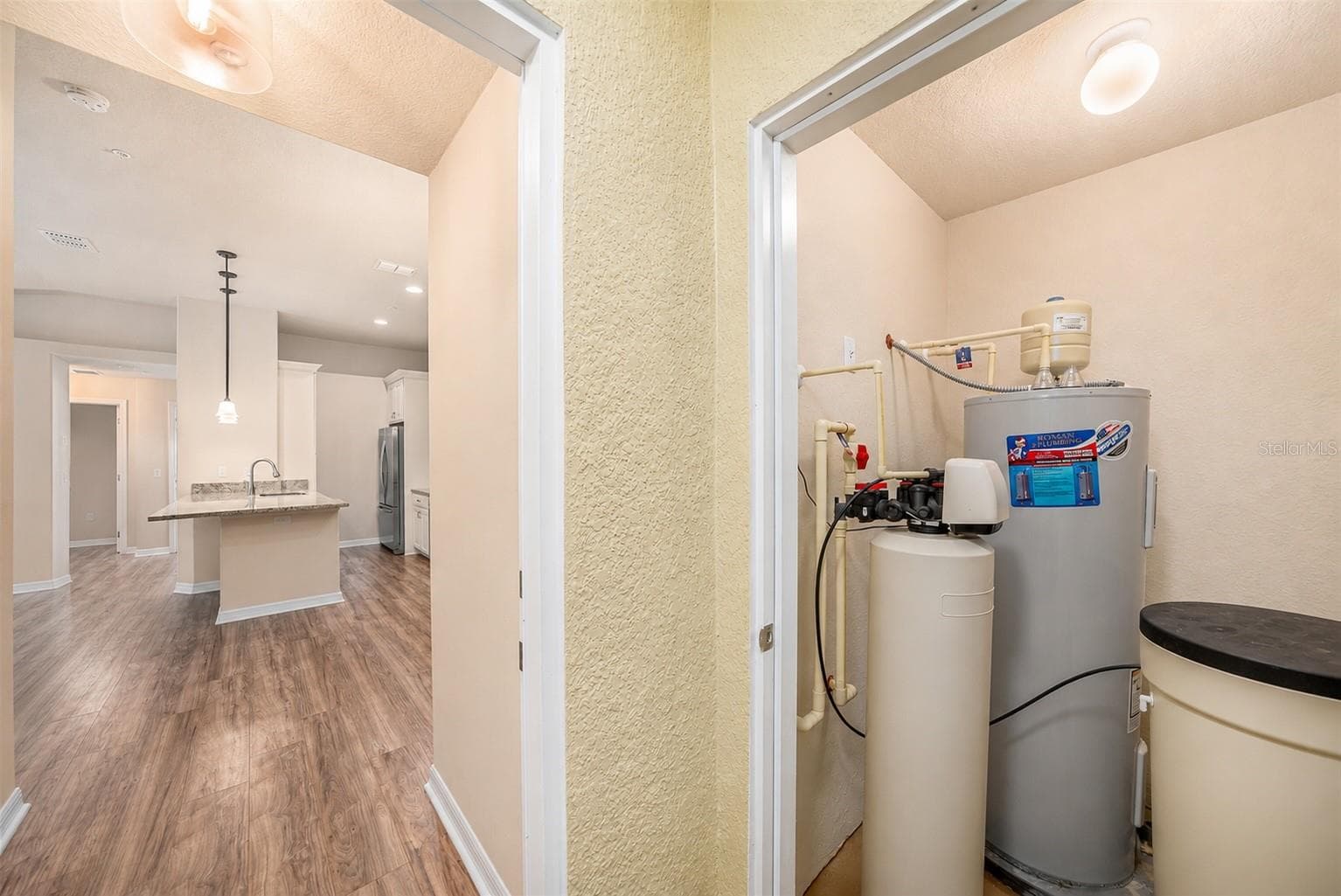 Water heater and water softener. - 5065 ROYAL PALMS WAY #303, NEW PORT RICHEY
