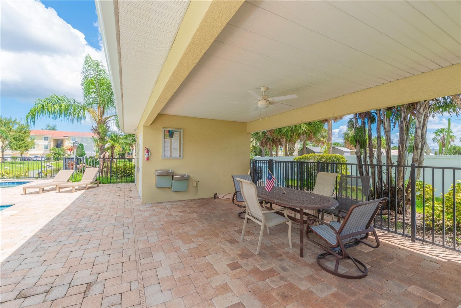 Covered area by the pool. - 5065 ROYAL PALMS WAY #303, NEW PORT RICHEY