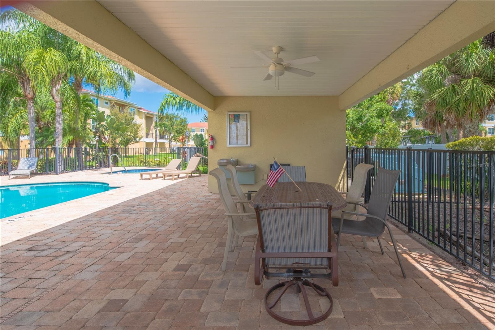 Covered area by the pool. - 5065 ROYAL PALMS WAY #303, NEW PORT RICHEY