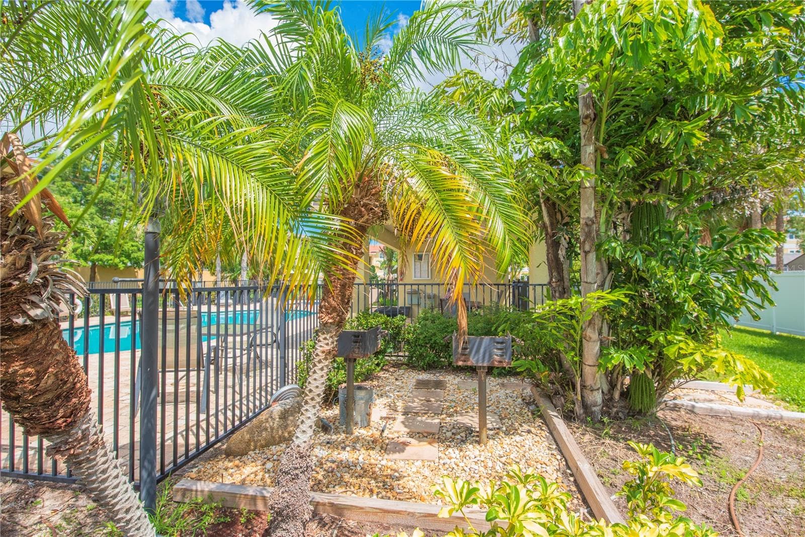 Community BBQ grills. - 5065 ROYAL PALMS WAY #303, NEW PORT RICHEY