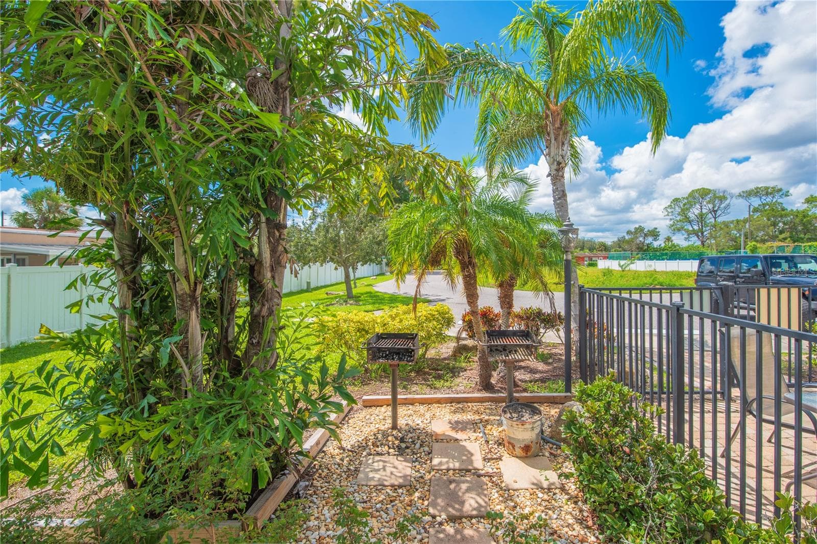 Community BBQ grills. - 5065 ROYAL PALMS WAY #303, NEW PORT RICHEY