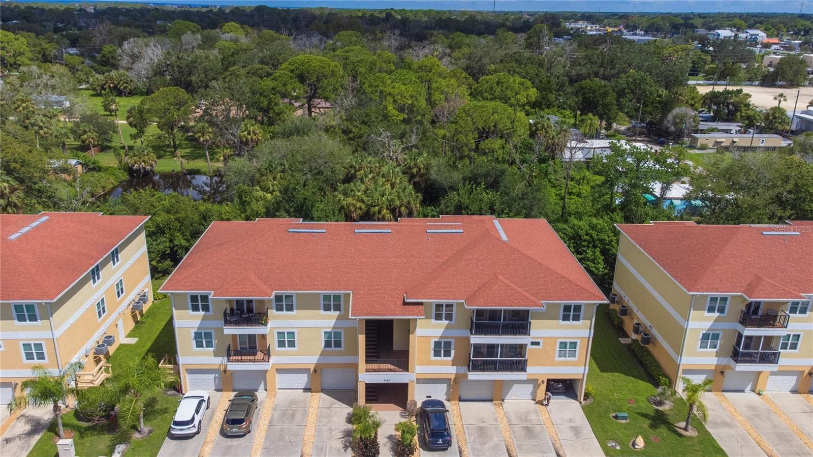 Aerial view of building 5065. - 5065 ROYAL PALMS WAY #303, NEW PORT RICHEY