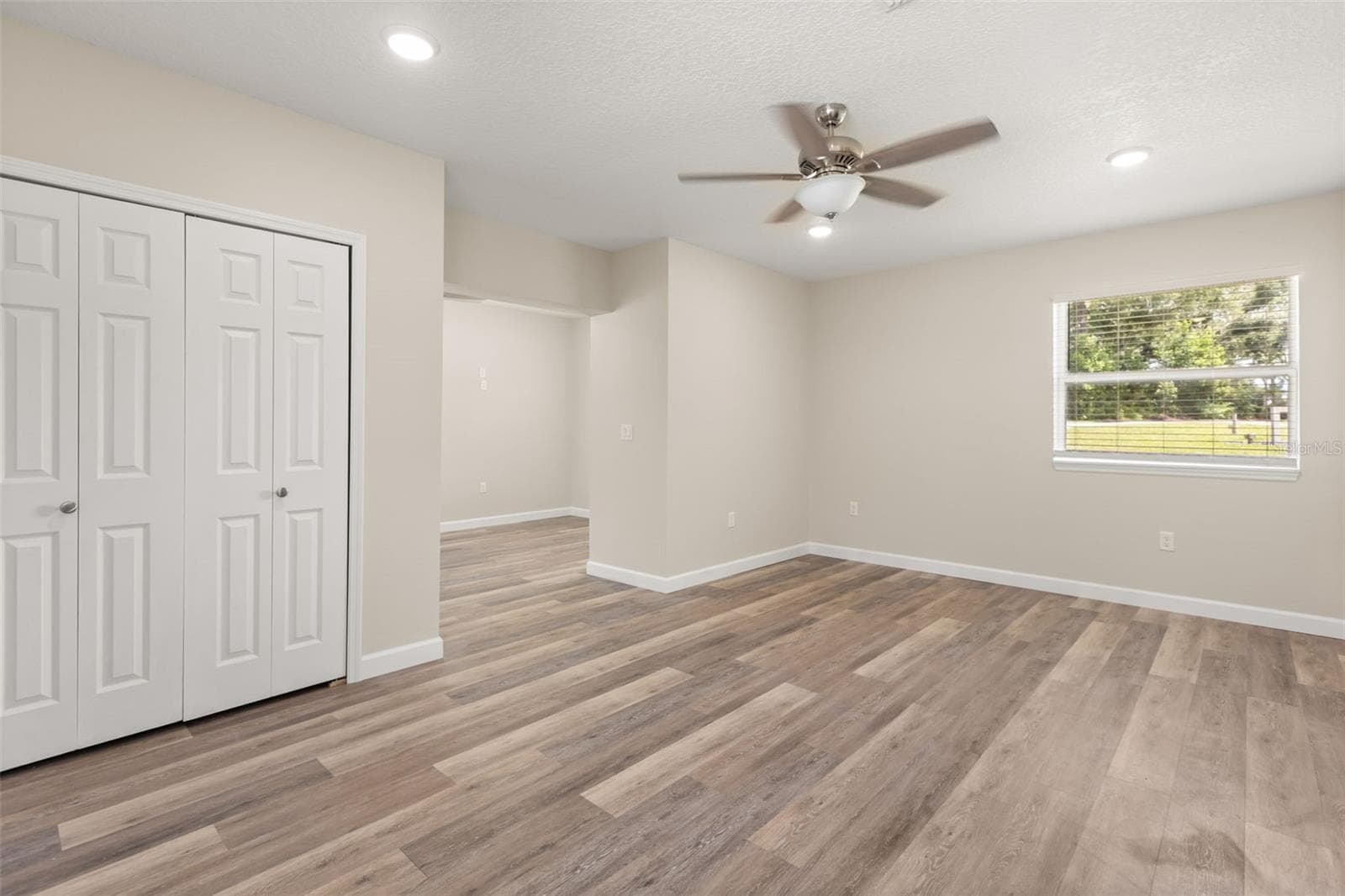 In-Law Suite Bedroom looking into Living Area - 1602 COUNTRY CLUB RD, EUSTIS