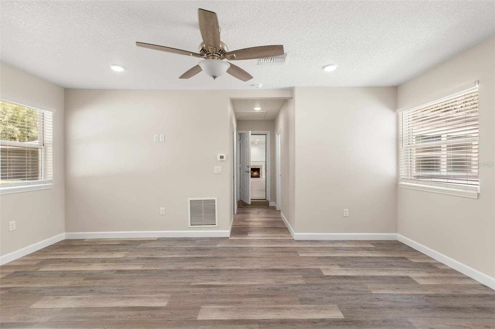 In-Law Suite Living Area looking back into main residence - 1602 COUNTRY CLUB RD, EUSTIS