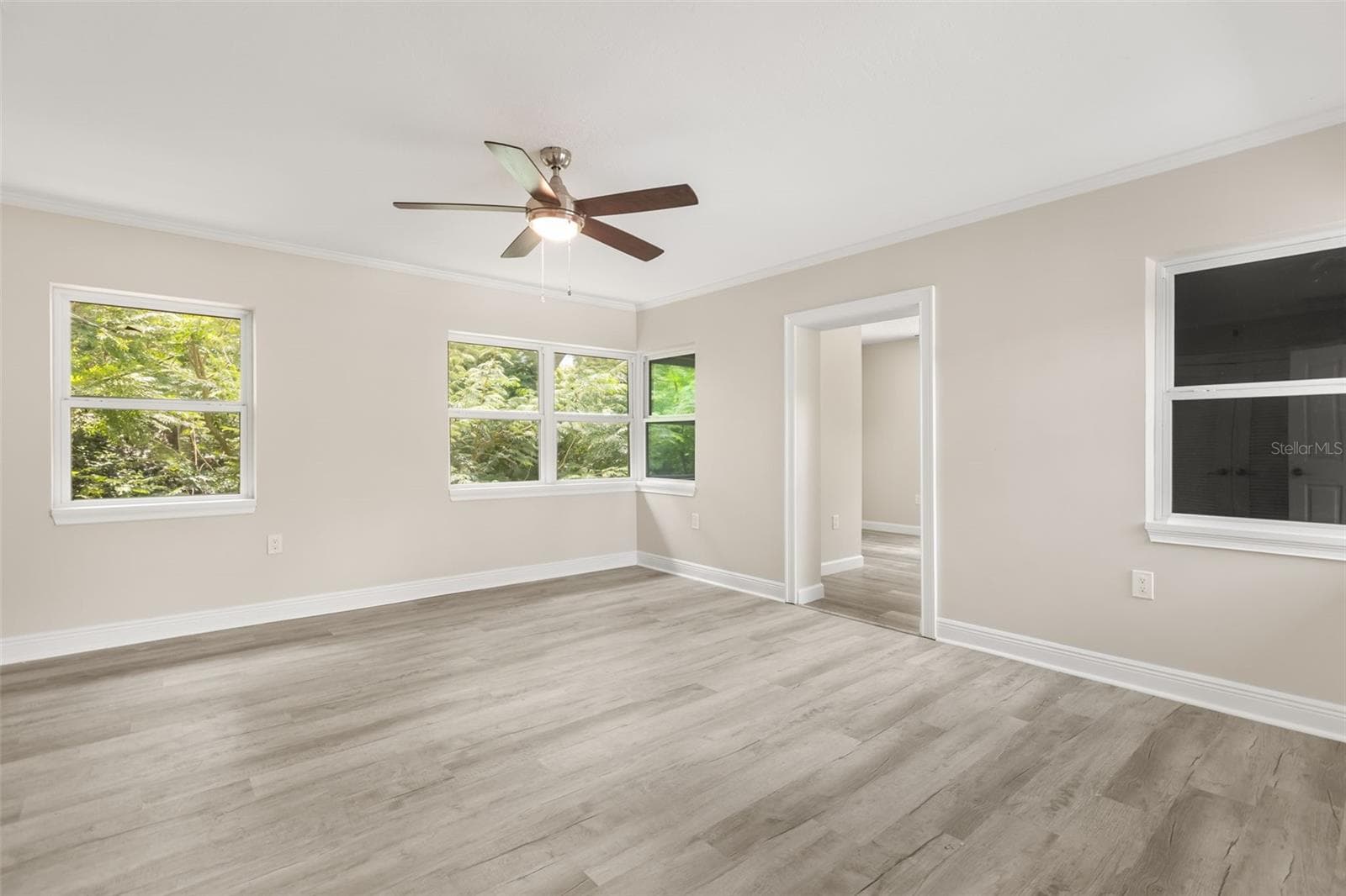 Bedroom 4 with office area and ensuite bathroom - 1602 COUNTRY CLUB RD, EUSTIS