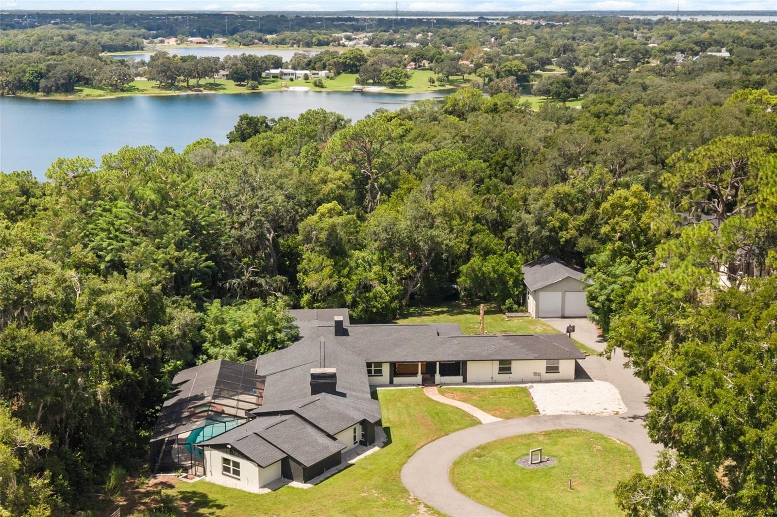 Property with East Crooked Lake in view - 1602 COUNTRY CLUB RD, EUSTIS