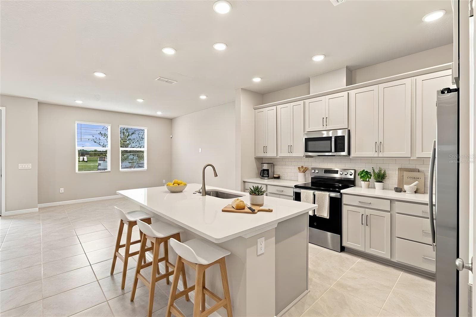 Kitchen **Virtually Staged - 5592 COOPERS HAWK CT, ST CLOUD
