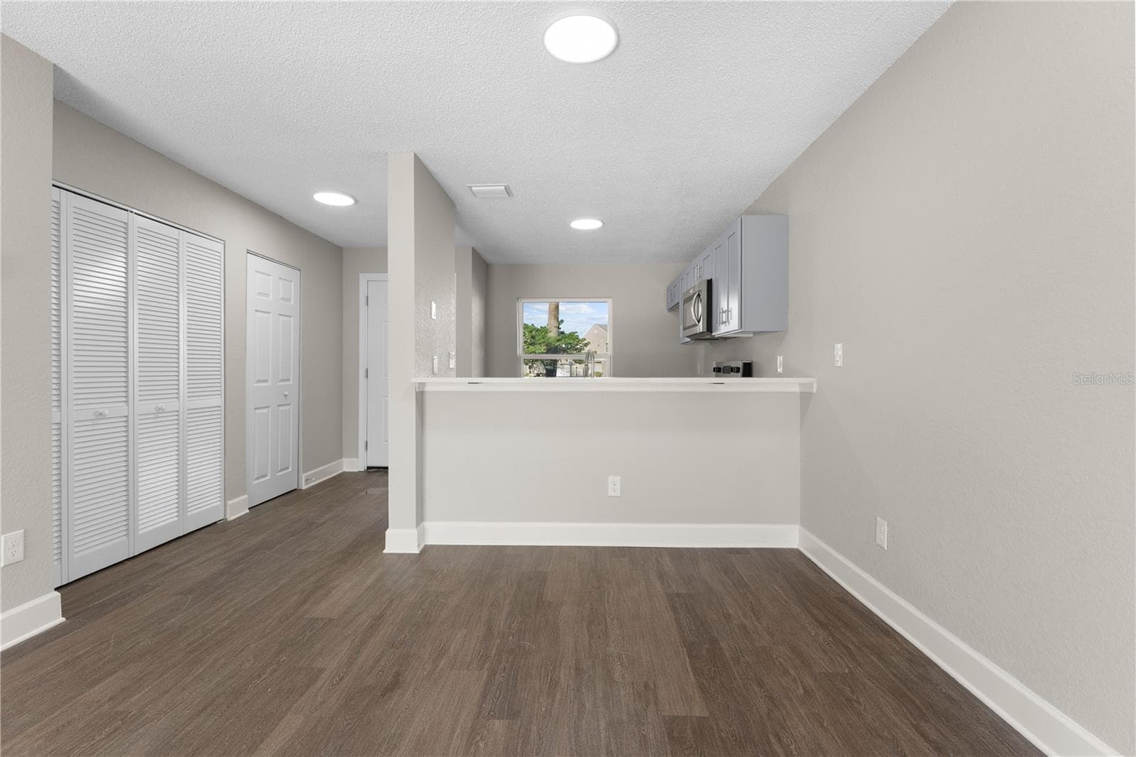 Great Room (Living + Dining) - 2508 WOODGATE BLVD #105, ORLANDO