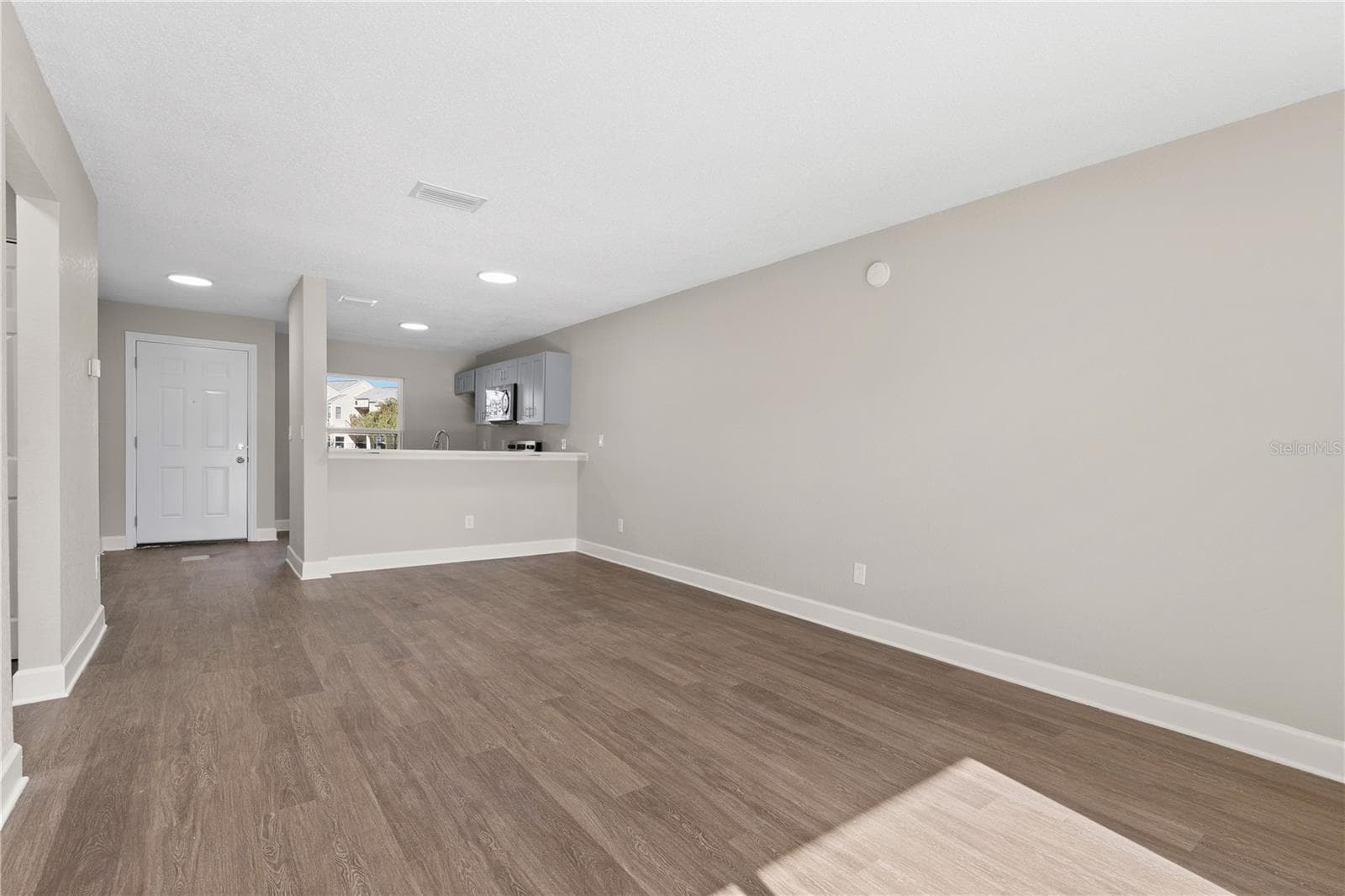 Great Room (Living + Dining) - 2508 WOODGATE BLVD #105, ORLANDO