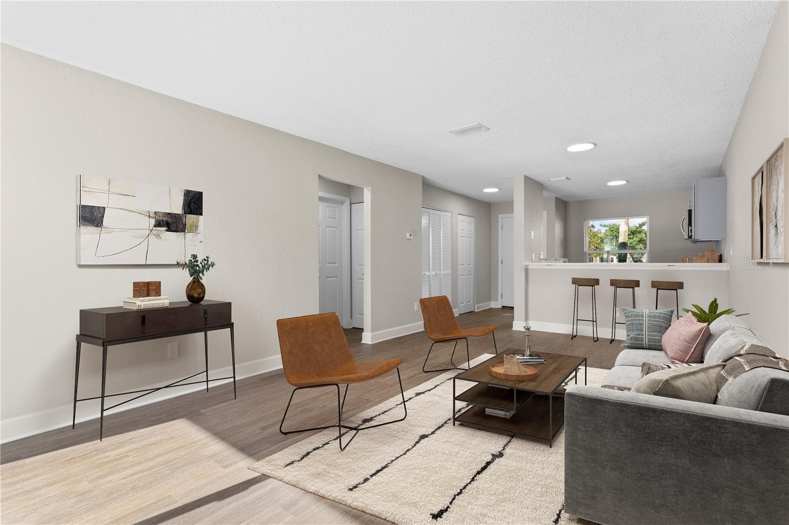 Great Room (Living + Dining) (Virtually Staged) - 2508 WOODGATE BLVD #105, ORLANDO