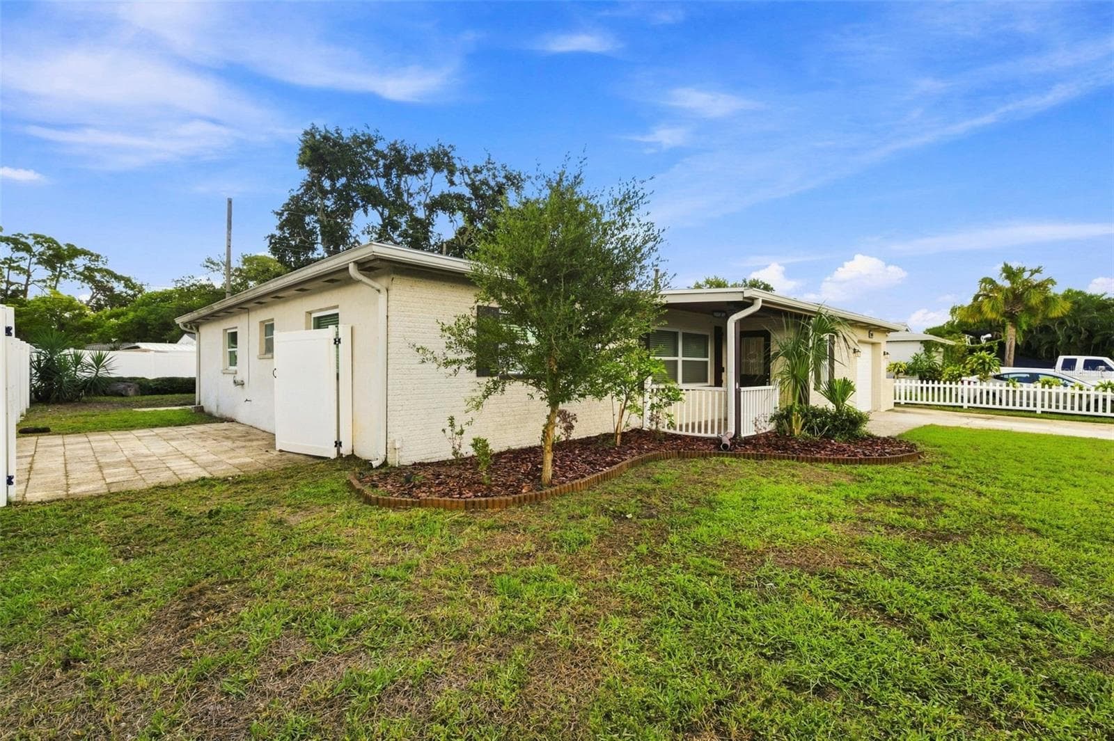 Side of Home. Gate for easy access. - 7719 91ST ST, SEMINOLE