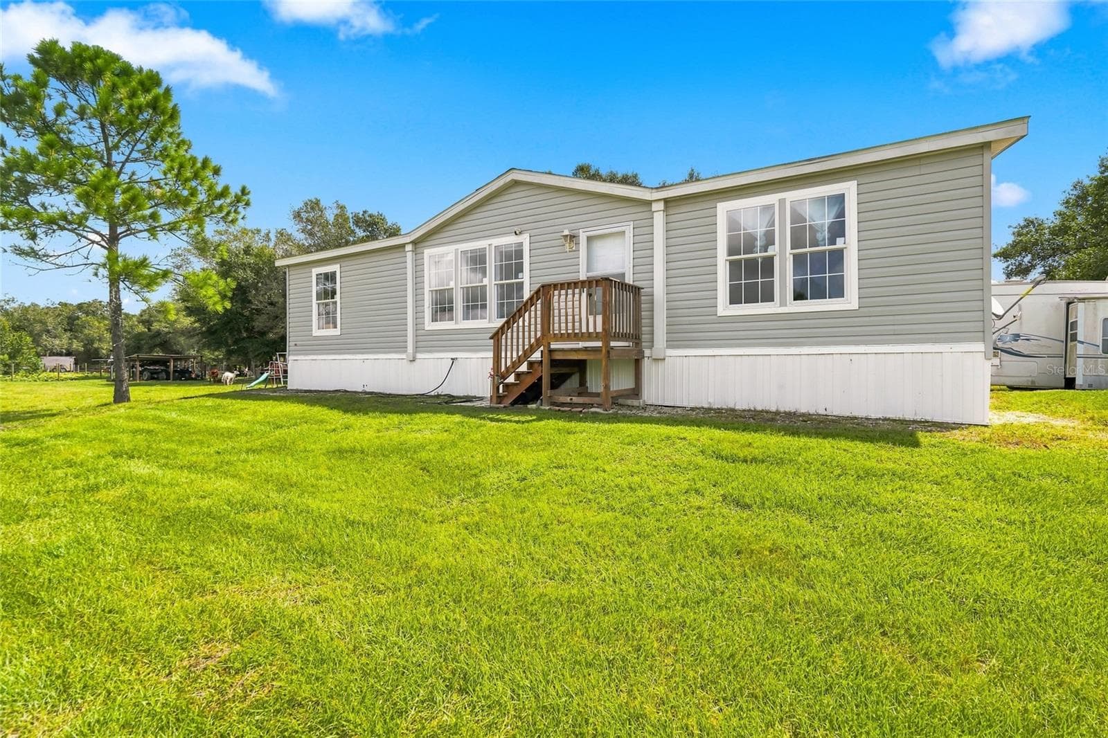 Manufactured Home at 20967 NW 250TH ST, OKEECHOBEE, photo 2 of 44