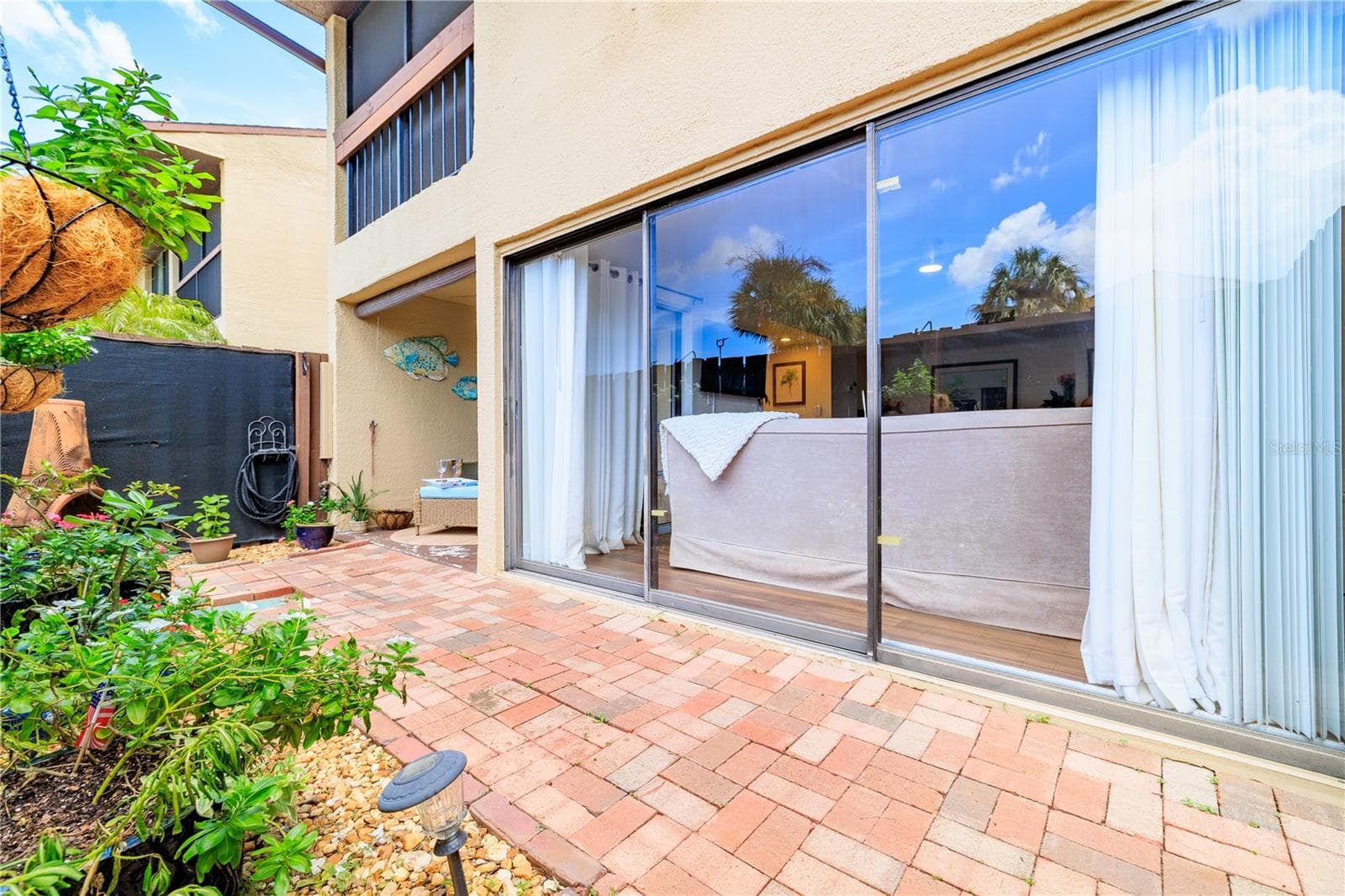 Perfect for gardening, and allowing your furbaby to roam - 782 VILLAGE LAKE TER N #103, ST PETERSBURG