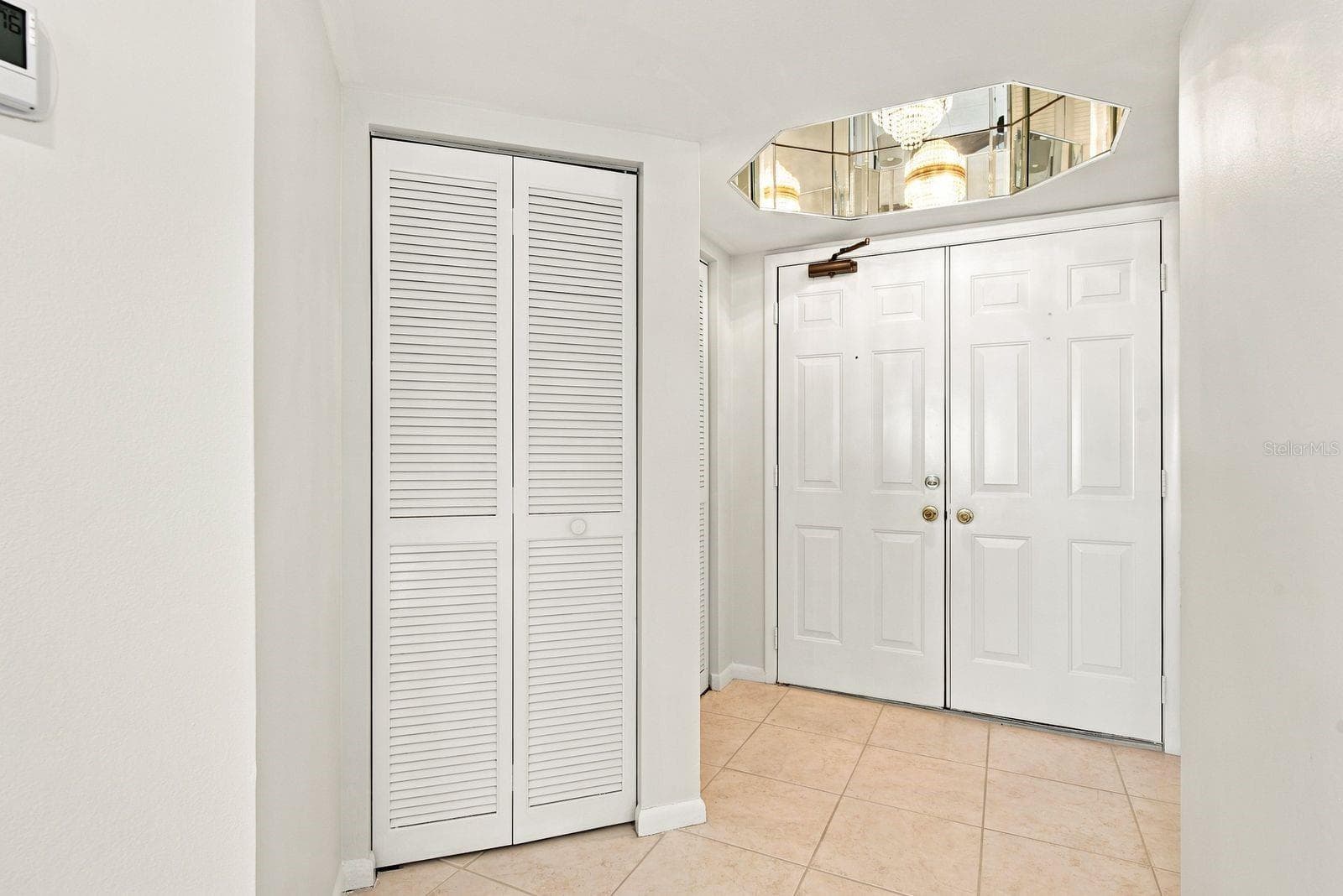 Interior front doors - 1310 GULF BLVD #4D, CLEARWATER BEACH