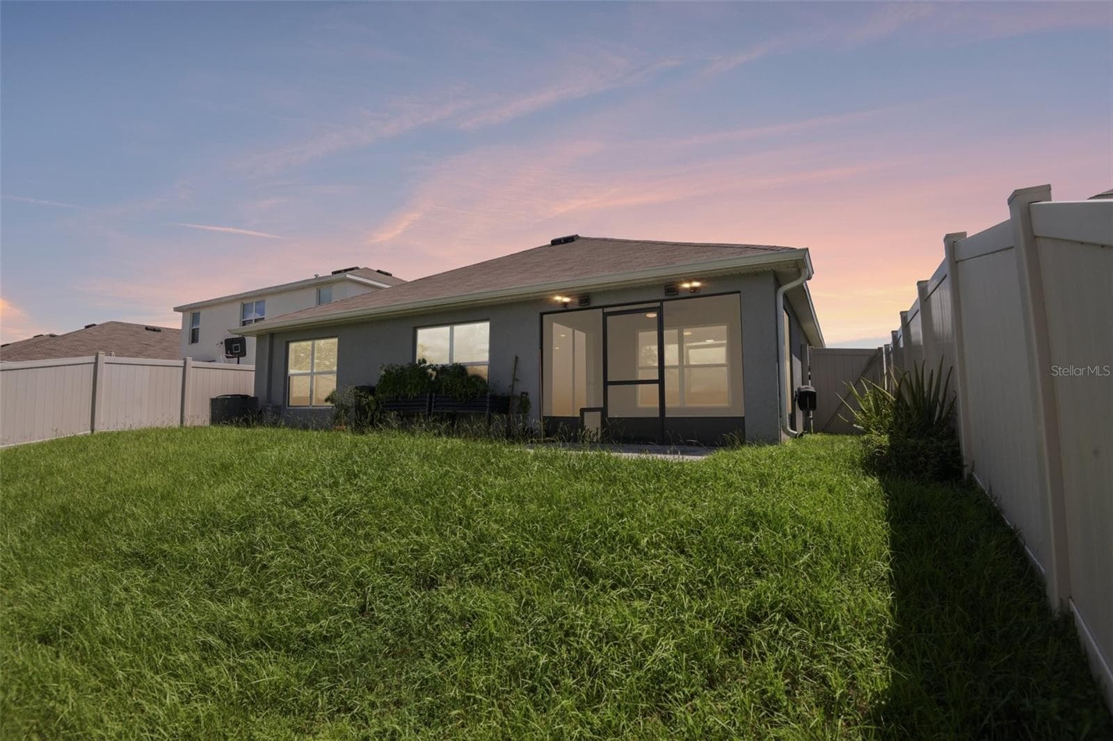 back of the house - 36945 GOFFAUX LOOP, ZEPHYRHILLS