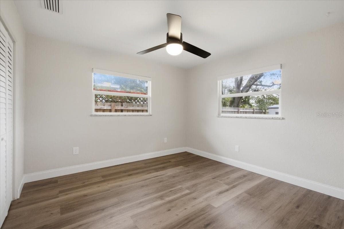 Bedroom #2 with Hurricane Impact Windows - 1837 PASADENA DR, DUNEDIN