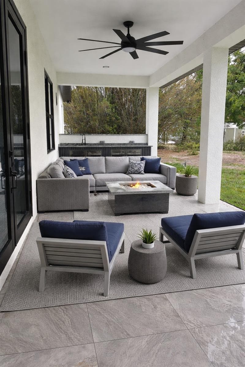 Rear Porch Virtually Staged - 4228 FOXWOOD BLVD, WESLEY CHAPEL